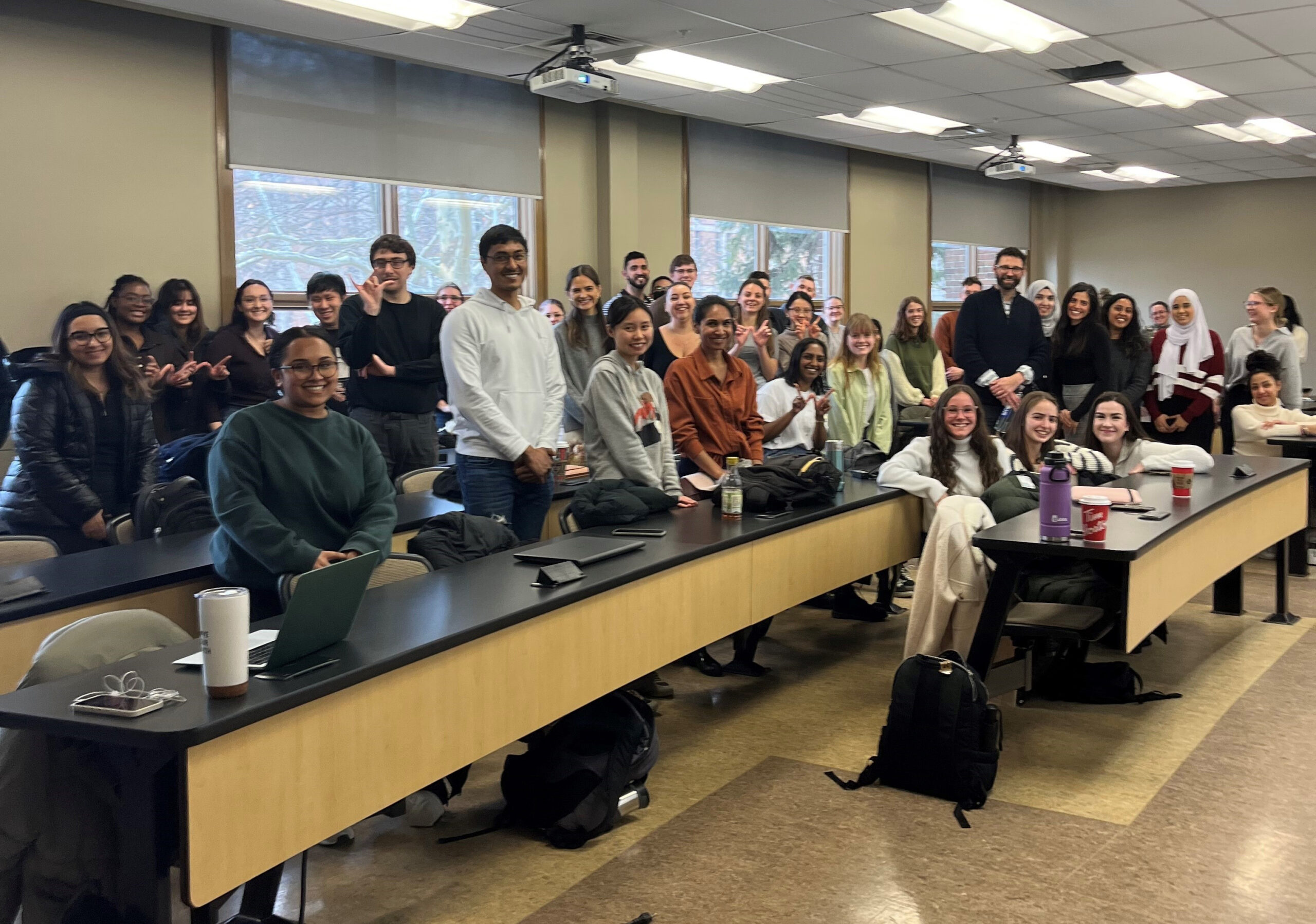 Paul Cahill standing in a classroom full of law students