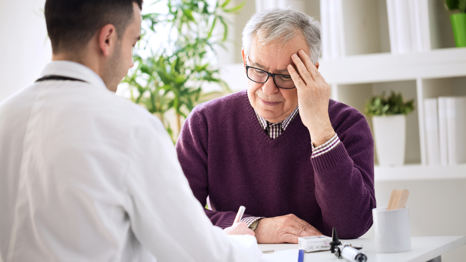 Male Patient With Headache Seeing a Doctor